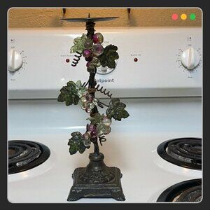 A 12 inch tall Iron Pillar Candle Holder